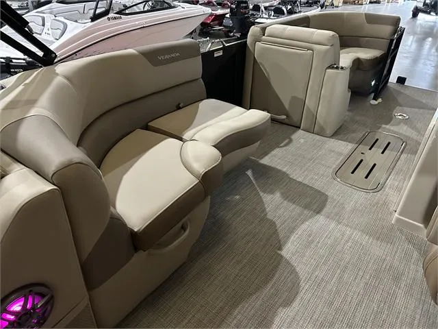 Slide: The Image of 2024 Veranda VR22RFL W/Yamaha 150 interior, featuring luxurious seating and modern design. - 17
