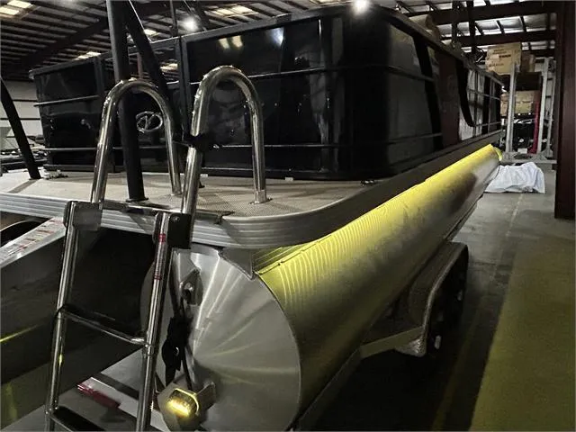 Slide: The Image of 2024 Veranda VR22RFL pontoon boat with Yamaha 150 engine in a warehouse. - 5