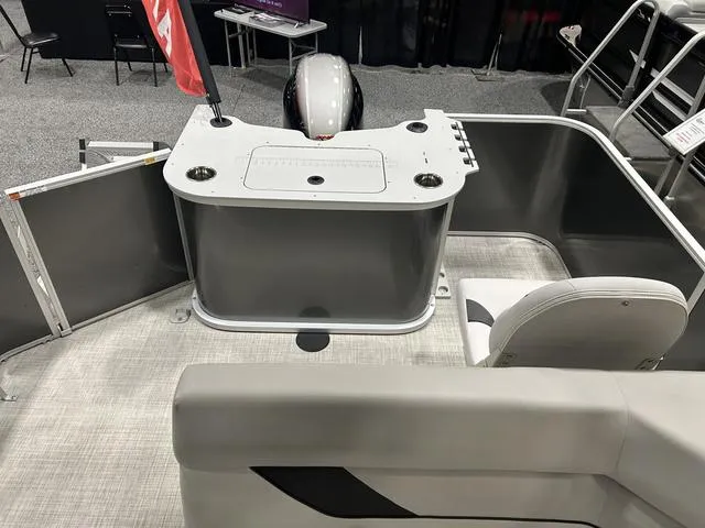 Slide: The Image of 2024 SunCatcher 20F W/Yamaha 90 SHO boat dashboard with steering wheel and gauges. - 10