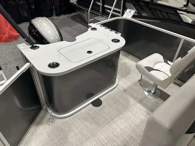 Slide: The Image of Close-up of 2024 SunCatcher 20F W/Yamaha 90 SHO dashboard with gauges and controls. - 11