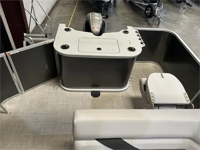 Slide: The Image of 2024 SunCatcher 20F boat interior with Yamaha 90 "SHO" engine, featuring seating and control panel. - 18