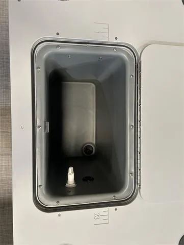 Slide: The Image of 2024 SunCatcher 20F livewell interior with measurement markings. - 24