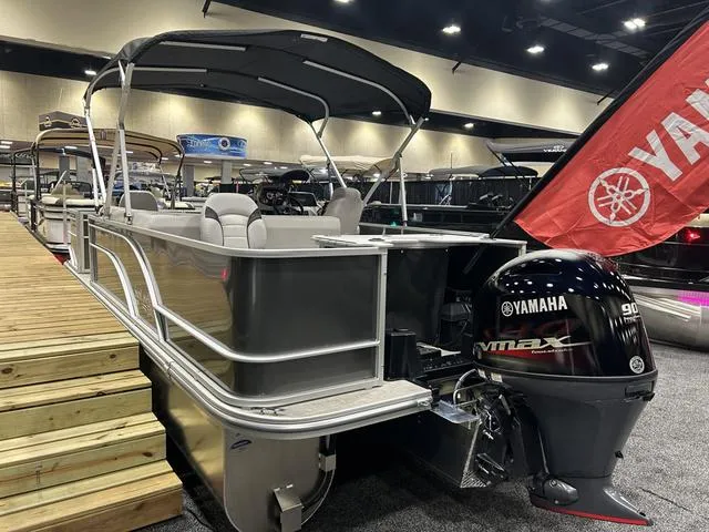 Slide: The Image of 2024 SunCatcher 20F pontoon boat with Yamaha 90 SHO engine on trailer in warehouse. - 3