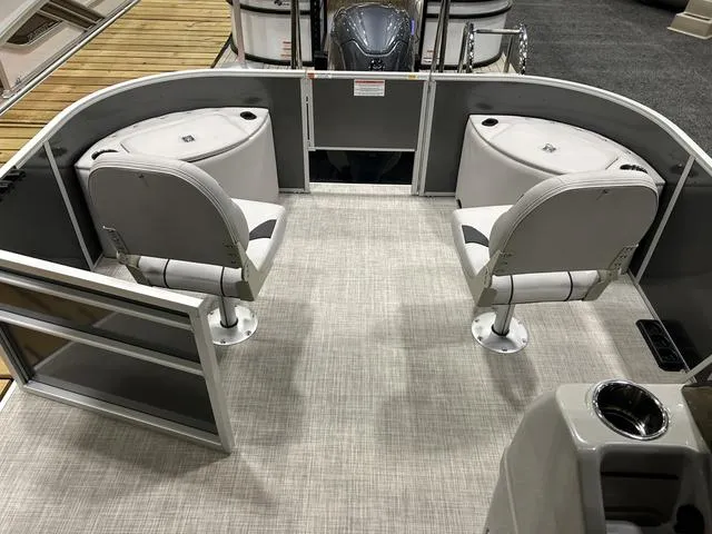 Slide: The Image of 2024 SunCatcher 20F pontoon boat with Yamaha 90 VMAX SHO outboard motor in a warehouse. - 5