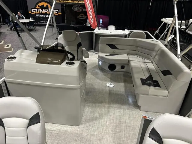 Slide: The Image of 2024 SunCatcher 20F W/Yamaha 90 SHO pontoon boat interior with plush seating. - 6