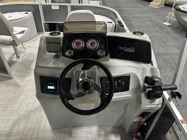 Slide: The Image of 2024 SunCatcher 20F W/Yamaha 90 SHO pontoon boat interior with seating and helm. - 8