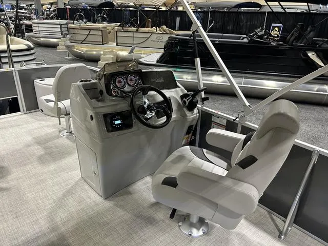 Slide: The Image of 2024 SunCatcher 20F W/Yamaha 90 SHO boat interior with seating and control panel. - 9