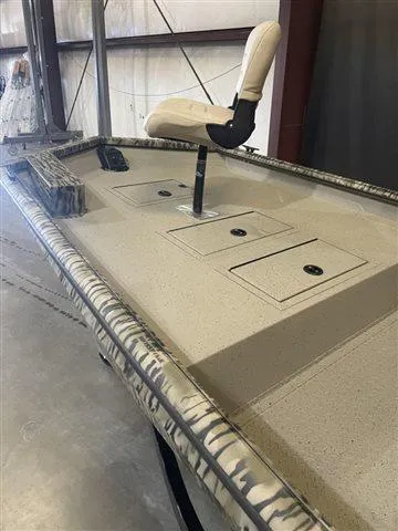 Slide: The Image of 2023 SeaArk RX 180 SC with Yamaha 90 SHO boat interior, featuring a raised seat and storage compartments. - 3