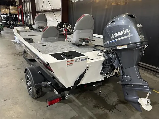 Slide: The Image of 2024 G3 Sportsman 1610 Vnl boat with Yamaha 50HP engine in a showroom. - 5