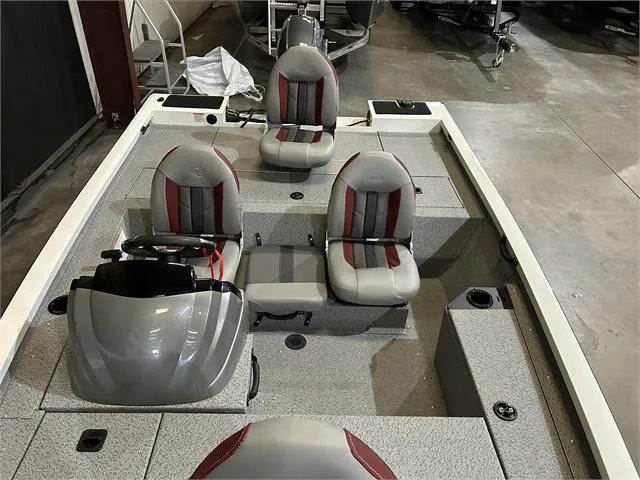 Slide: The Image of 2024 G3 Sportsman 1610 Vnl boat interior with Yamaha 50HP engine, featuring three seats. - 8