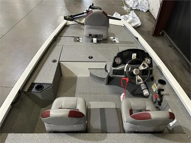 Slide: The Image of 2024 G3 Sportsman 1610 Vnl boat interior with Yamaha 50HP engine, gray and red seats. - 9