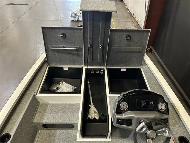 Slide: The Image of 2024 G3 Sportsman 1710 W/Yamaha 90 HP SHO boat interior with storage compartments and steering console. - 8