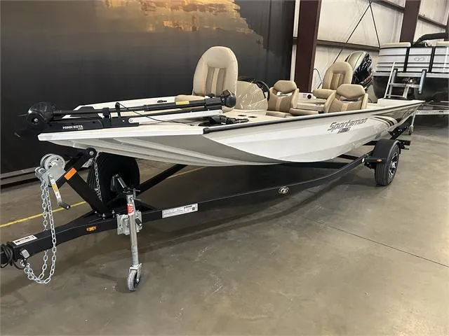 Slide: The Image of 2024 G3 Sportsman 1710 PFX with Yamaha 90 SHO, displayed on a trailer in a showroom. - 2