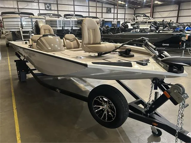 Slide: The Image of 2024 G3 Sportsman 1710 PFX with Yamaha 90 SHO, displayed in a showroom. - 3