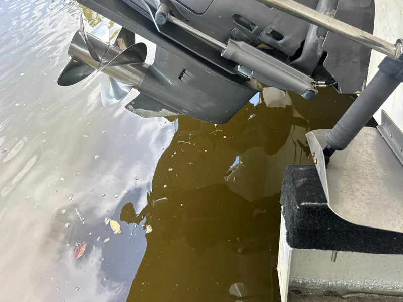 Slide: The Image of Close-up of a 2004 Larson 330 boat propeller in water. - 19