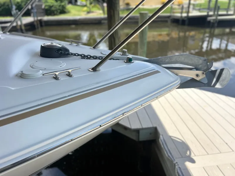 Slide: The Image of Close-up of 2004 Larson 330 boat bow at dock. - 7