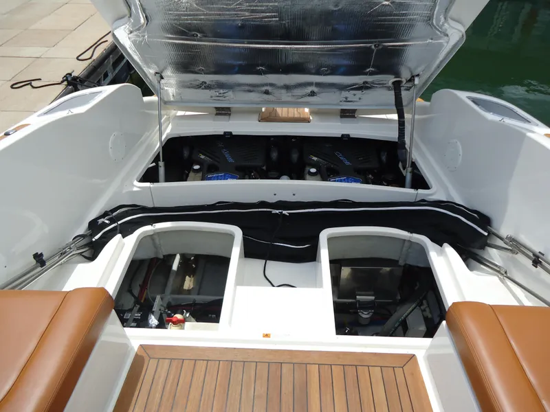 Slide: The Image of 2009 Chris-Craft Corsair 36 boat engine compartment with open hatch. - 16