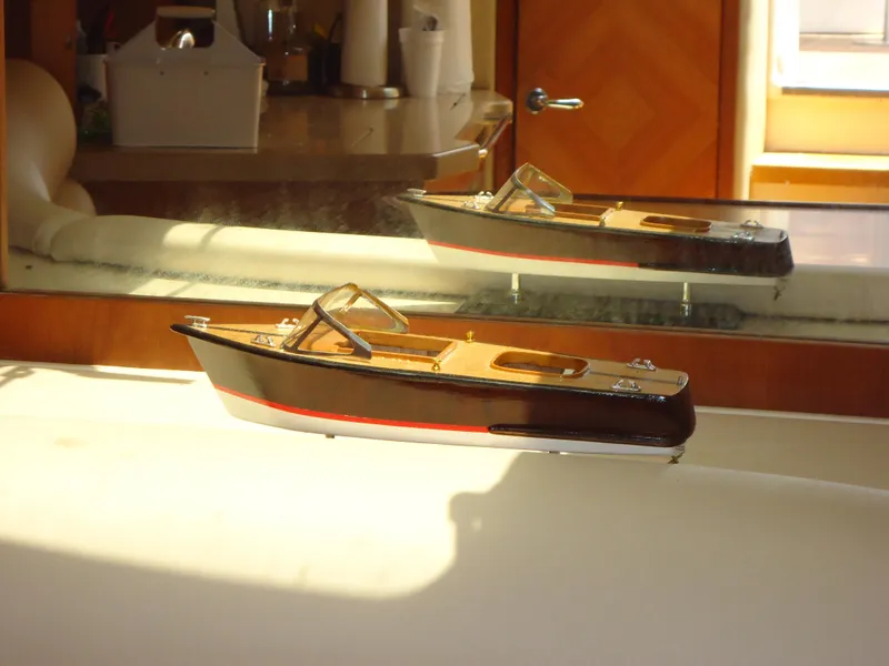 Slide: The Image of Model of a 2009 Chris-Craft Corsair 36 boat displayed indoors. - 27