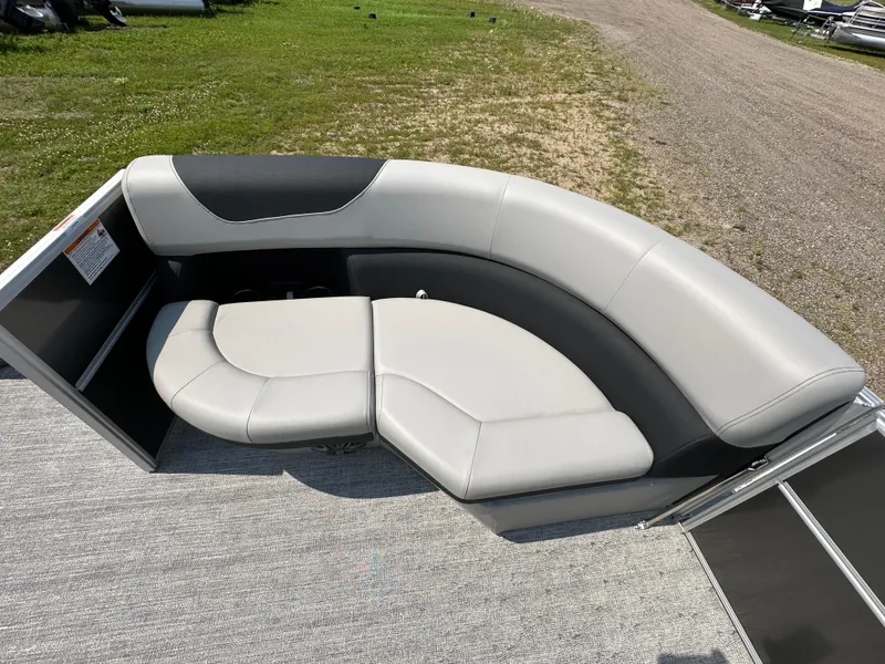 Slide: The Image of 2025 South Bay 220RSLE pontoon boat with luxurious seating. - 11