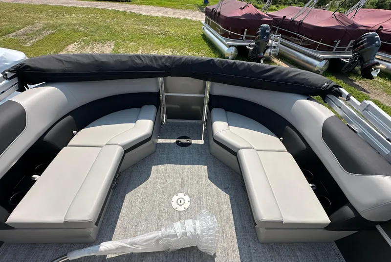 Slide: The Image of 2025 South Bay 220RSLE pontoon boat interior with spacious seating and modern design. - 9