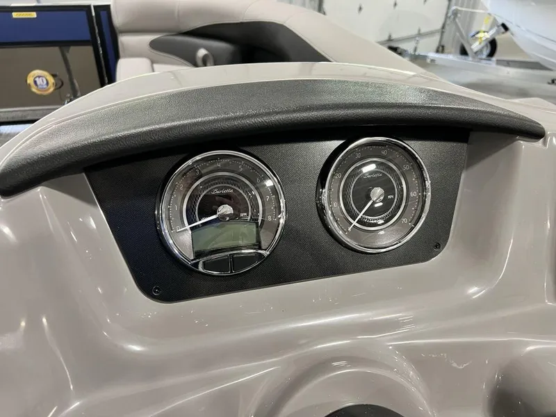 Slide: The Image of Close-up of 2025 Barletta ARIA A22UC boat dashboard with gauges. - 14