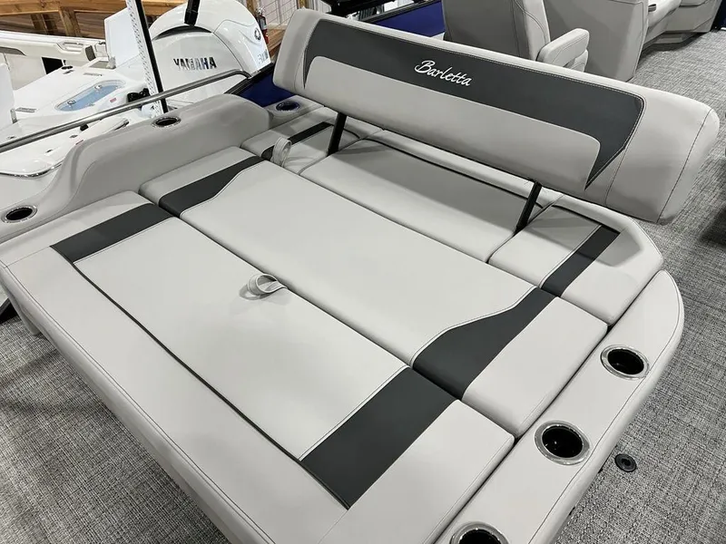 Slide: The Image of 2025 Barletta ARIA A22UC boat interior seating with gray and black upholstery. - 18
