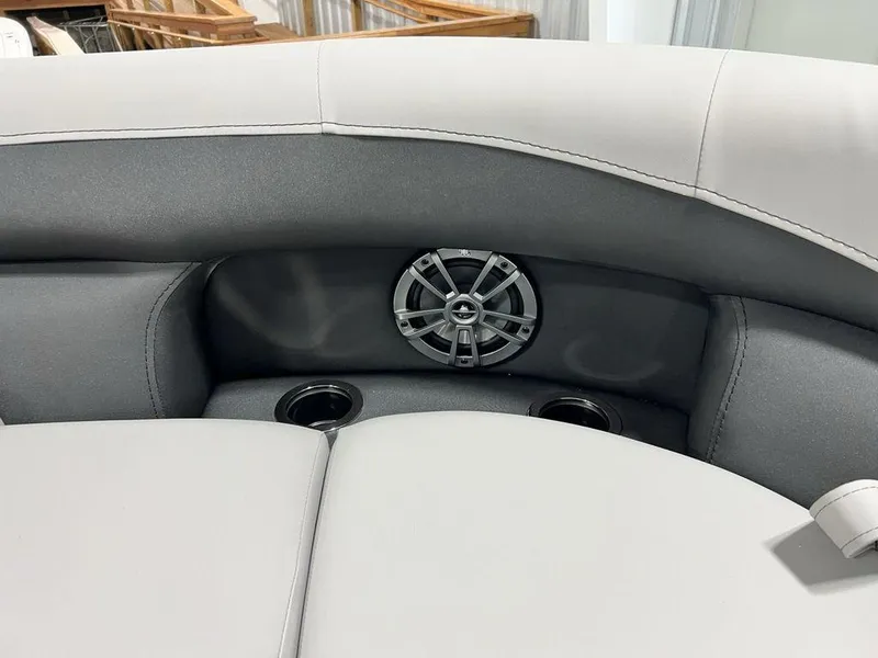 Slide: The Image of Barletta ARIA A22UC 2025 boat interior with speaker and cup holders. - 4