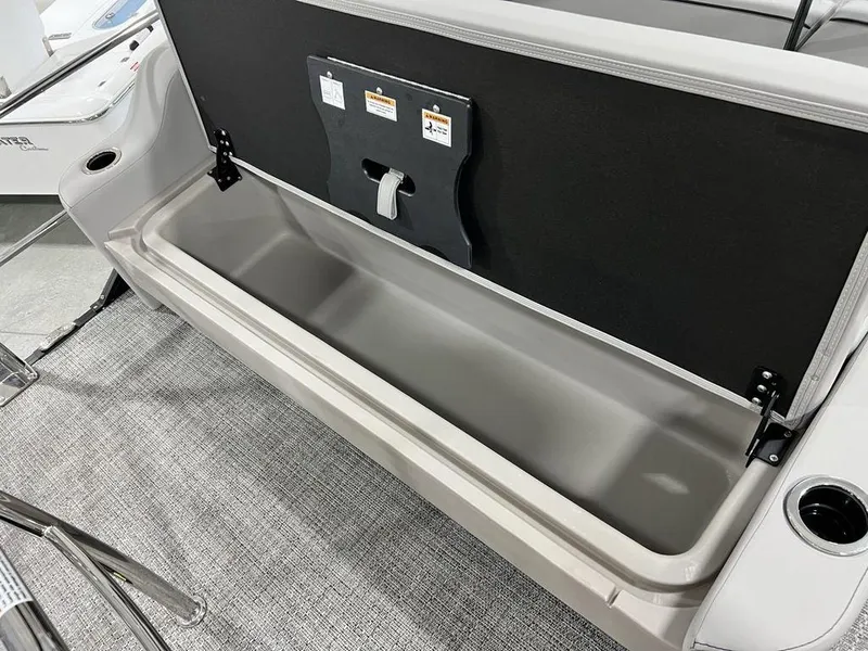 Slide: The Image of 2025 Barletta ARIA A22UC boat storage compartment with open lid. - 9