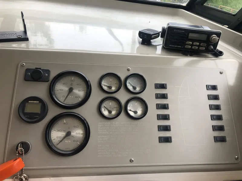 Slide: The Image of 1997 Bayliner Ciera 2452 Express dashboard with gauges and radio equipment. - 39