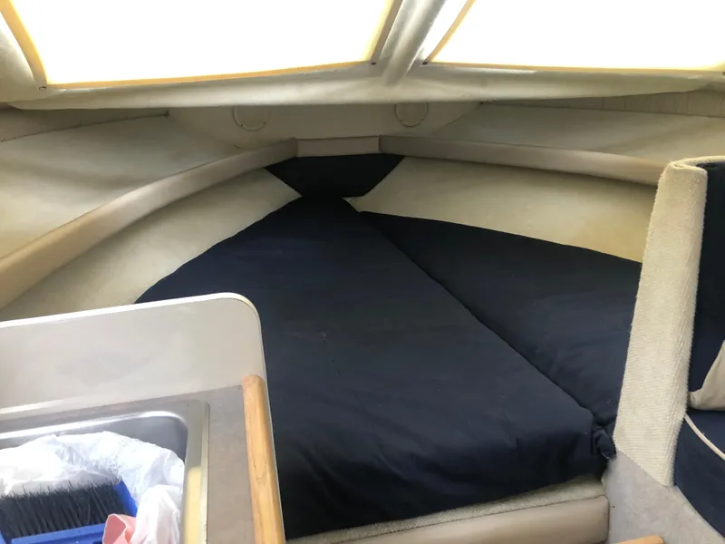 Slide: The Image of 1997 Bayliner Ciera 2452 Express cabin interior with cozy sleeping area. - 46