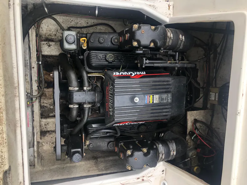 Slide: The Image of Engine compartment of a 1997 Bayliner Ciera 2452 Express with MerCruiser engine. - 19