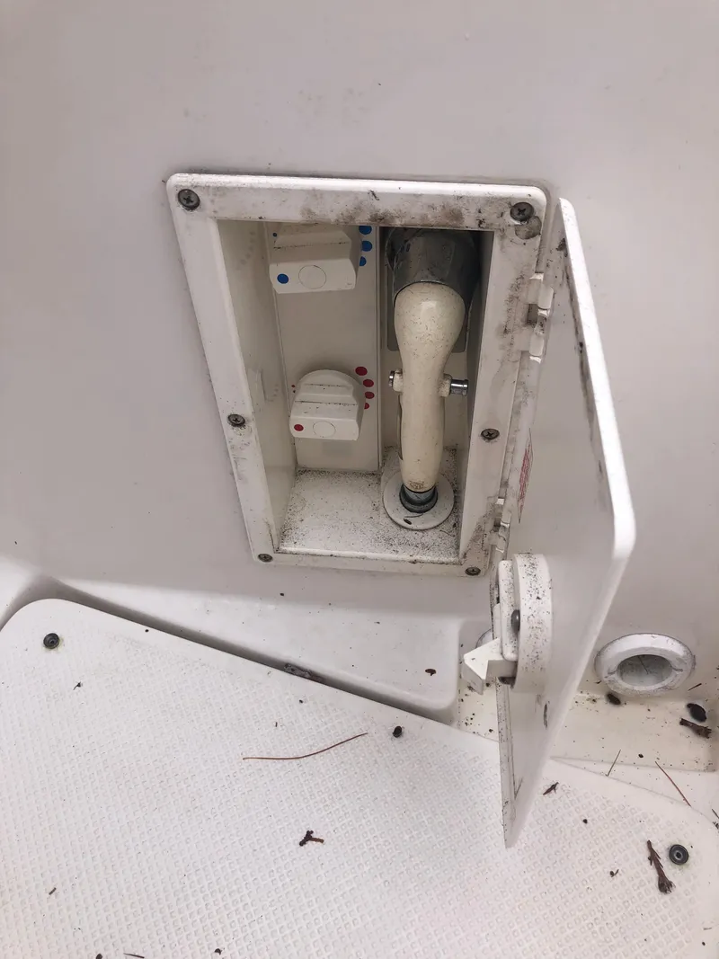 Slide: The Image of 1997 Bayliner Ciera 2452 Express boat compartment with open access panel. - 31