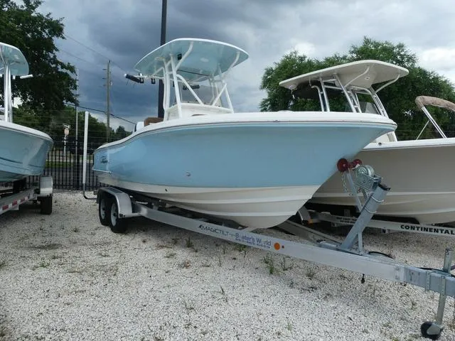 Slide: The Image of 2025 Pioneer Islander 222 boat on a trailer, front view. - 2