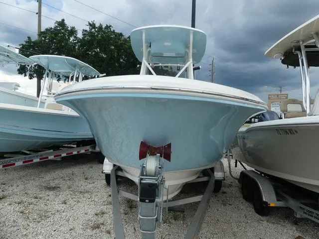 Slide: The Image of 2025 Pioneer Islander 222 boat on a trailer, front view. - 3