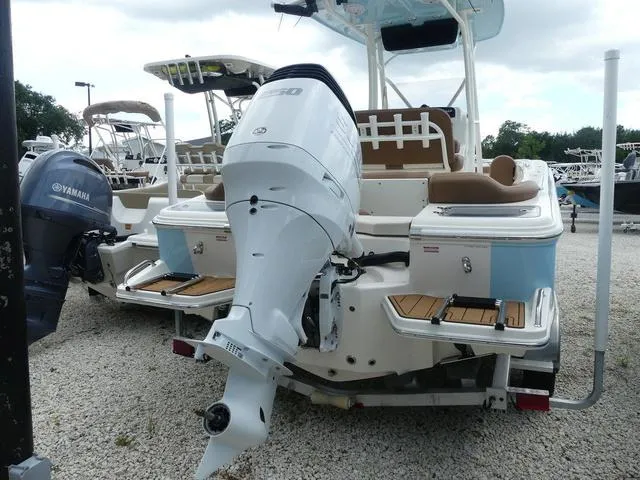Slide: The Image of 2025 Pioneer Islander 222 boat rear view with outboard motor. - 8
