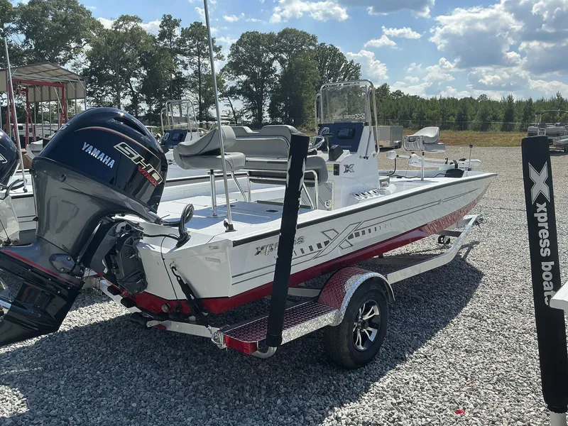 Slide: The Image of 2025 Xpress H20B NEW CONSOLE boat with Yamaha engine on trailer. - 8