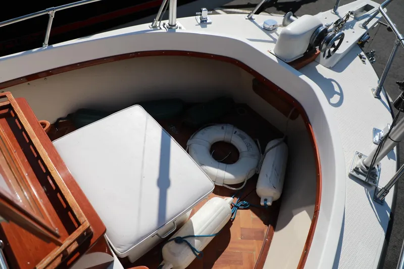 Slide: The Image of 1982 Shamrock Pilothouse boat interior with life rings and cushions. - 7