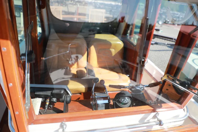 Slide: The Image of 1982 Shamrock Pilothouse interior with navigation controls and seating. - 9