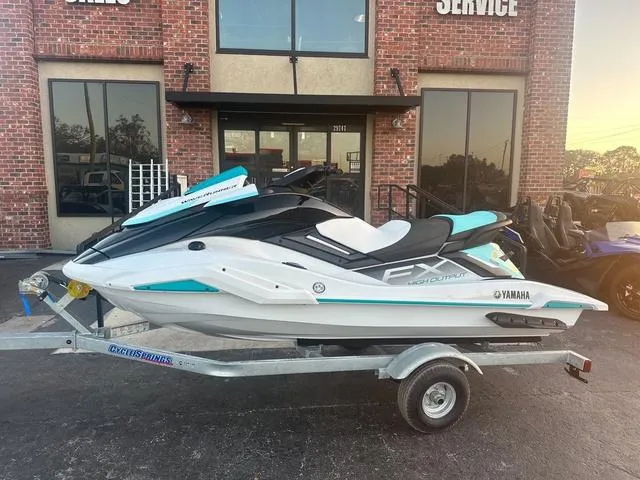 Slide: The Image of 2024 Yamaha Marine Waverunner FX HO, white and black, dashboard and controls close-up. - 3