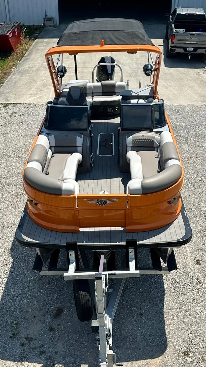 Slide: The Image of 2023 Avalon Excalibur Elite Windshield boat on trailer, top view. - 15