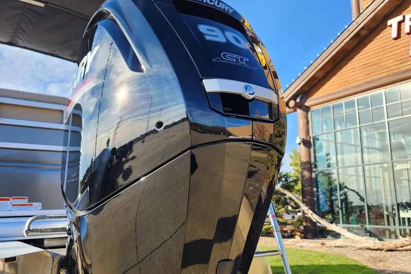 Slide: The Image of 2024 Sun Tracker Party Barge 20 DLX with Mercury 90 CT outboard motor. - 2