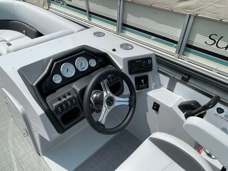 Slide: The Image of 2025 Bentley Pontoons Legacy 220 Swingback dashboard and steering wheel. - 14