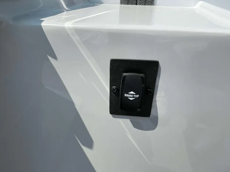 Slide: The Image of Bimini top switch on 2025 Bentley Pontoons Legacy 220 Swingback boat. - 19