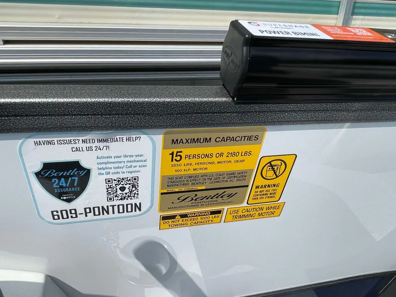 Slide: The Image of 2025 Bentley Pontoons Legacy 220 Swingback capacity and safety labels. - 20