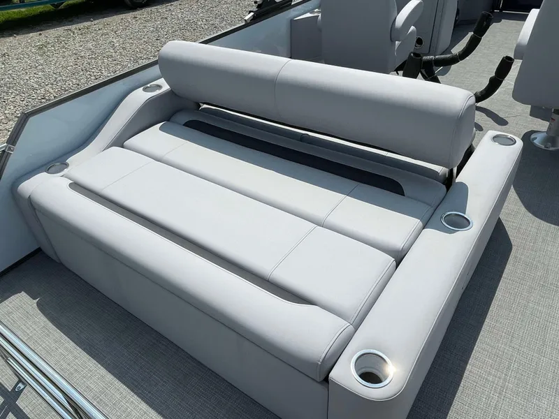 Slide: The Image of 2025 Bentley Pontoons Legacy 220 Swingback seating area with cup holders. - 22