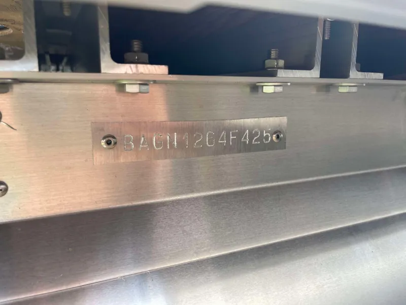 Slide: The Image of Hull identification number (HIN) on a 2025 Bentley Pontoons Legacy 220 Swingback. - 24