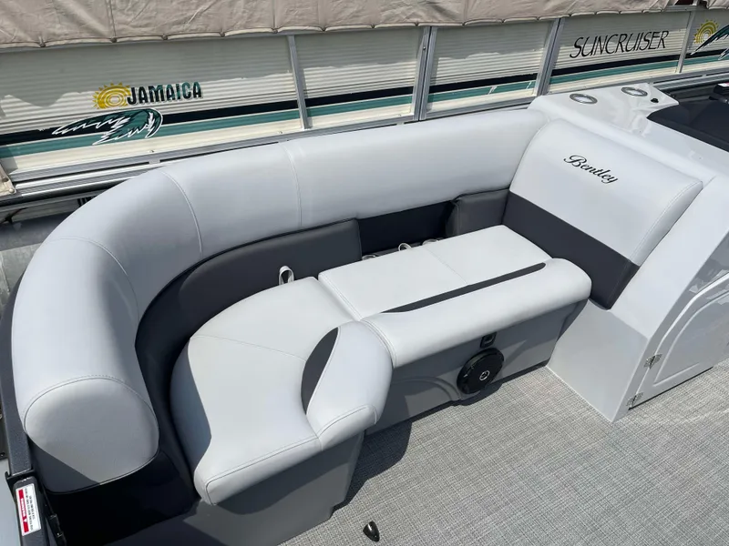 Slide: The Image of Bentley Pontoons Legacy 220 Swingback 2025 interior seating with gray upholstery. - 8
