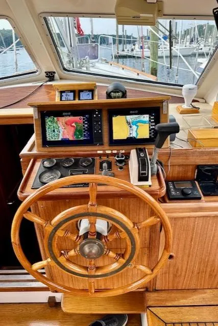 Slide: The Image of Wooden helm of 2002 Vilm 116 yacht with navigation screens. - 18