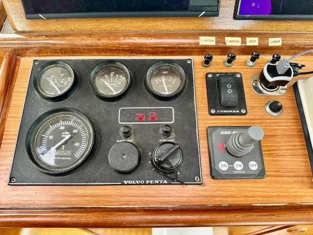 Slide: The Image of Boat control panel with Volvo Penta gauges and switches, Vilm 116, 2002 model. - 19