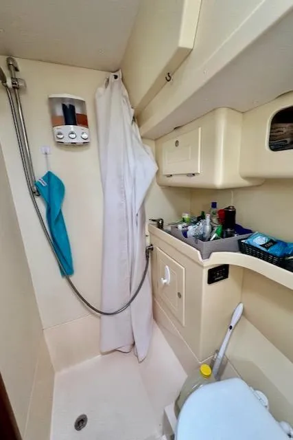 Slide: The Image of Compact bathroom in 2002 Vilm 116 yacht with shower and storage. - 23